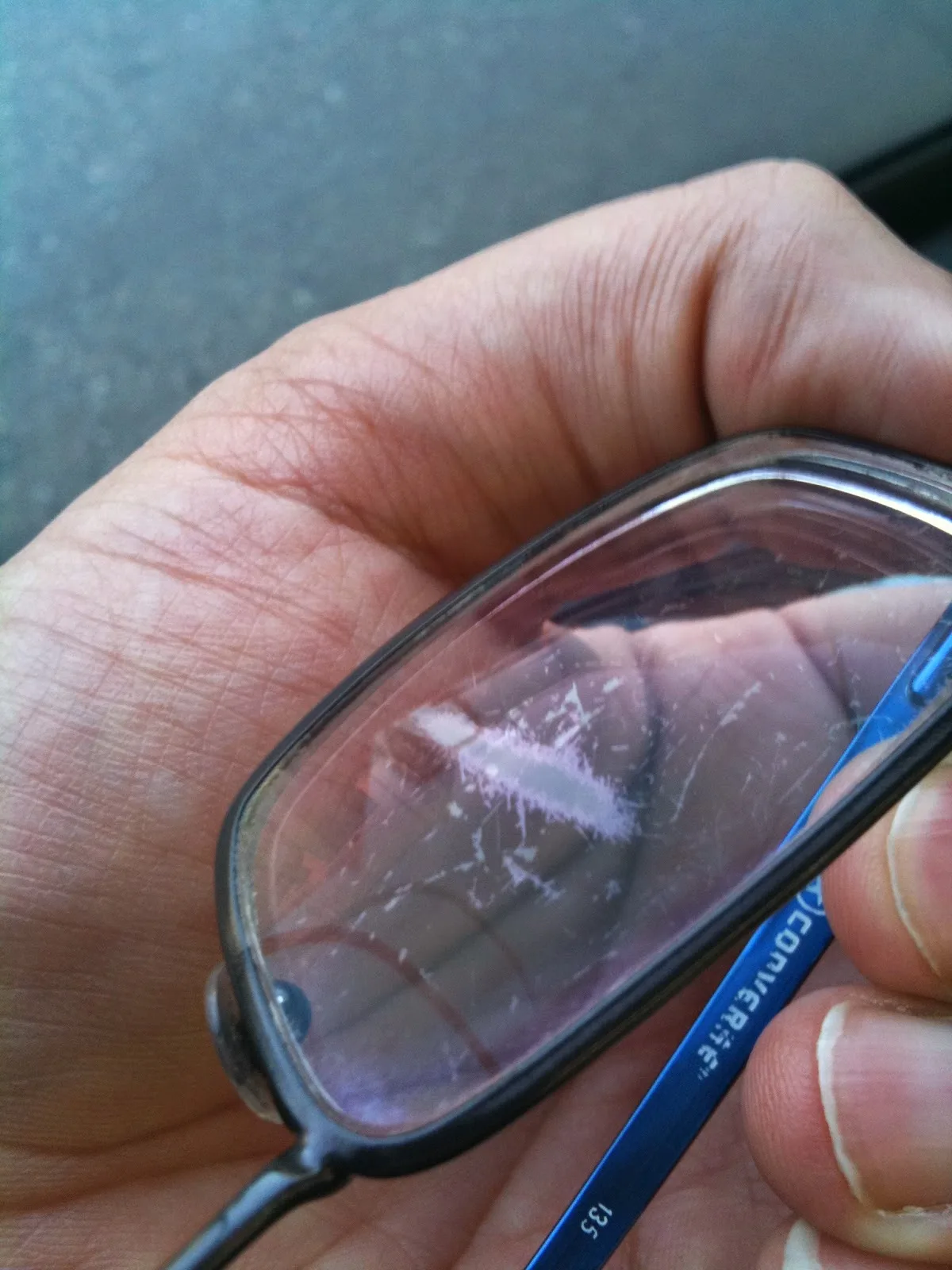 scratched rifle scope lens