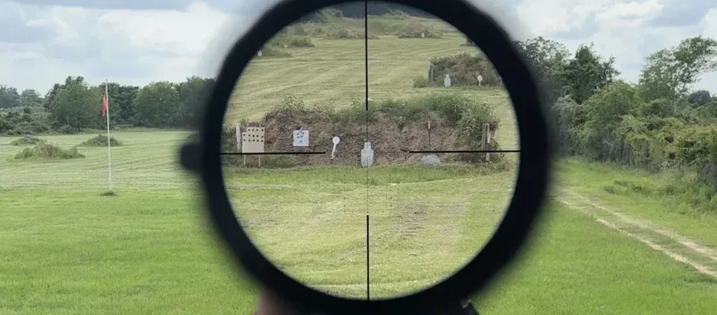 What is a rifle scope reticle?