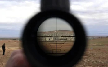 Why does my rifle scope have a black circle?
